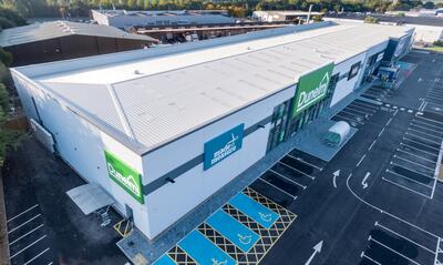 DIY store in UK showcasing Colorcoat Aquatite gutters, Trisomet roof and Trimapanel walls