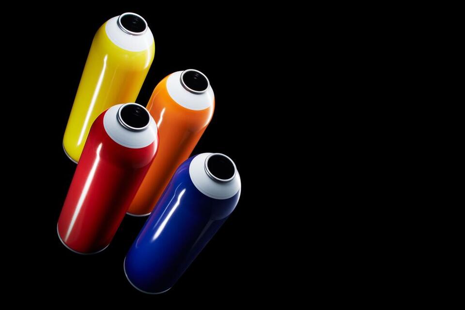 Aerosols made from Protact in four colours