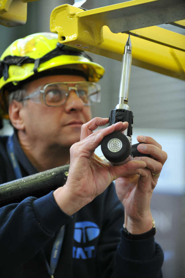Tata Steel operative working on steel component Tata Steel operative working on steel component