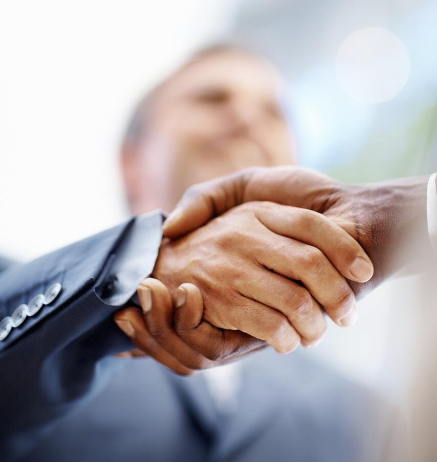 Close up of handshake between business colleagues Close up of handshake between business colleagues