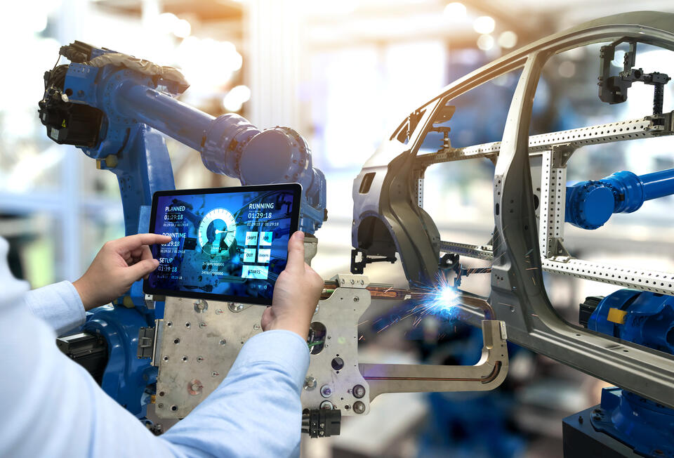 Man using technology at a smart factory