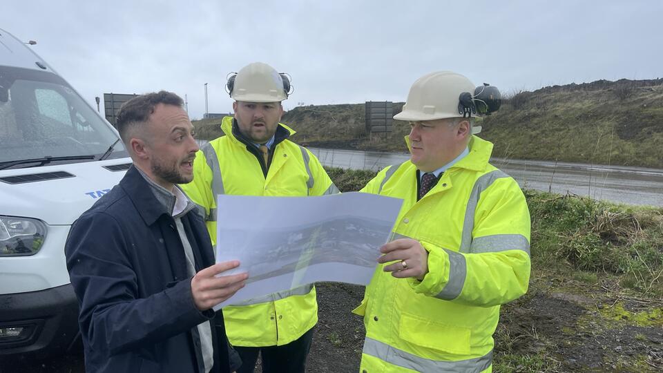 Tata Steel's Lewis Clark shows Sam Kurtz and Darren Miller plans for the new EAF