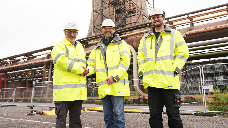 Tata Steel and Systems Group shake hands