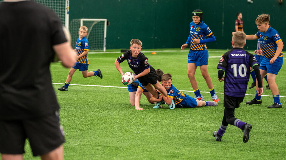 Children playing rugby in the Tata Steel UK Wizards League finals